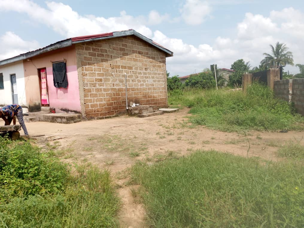 1 Plot of Land with Old Structure For Sale at Amasaman Dobro 