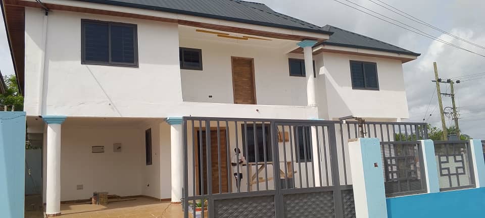 Five (5) Bedroom House with 3 Shops For Sale at Amasaman