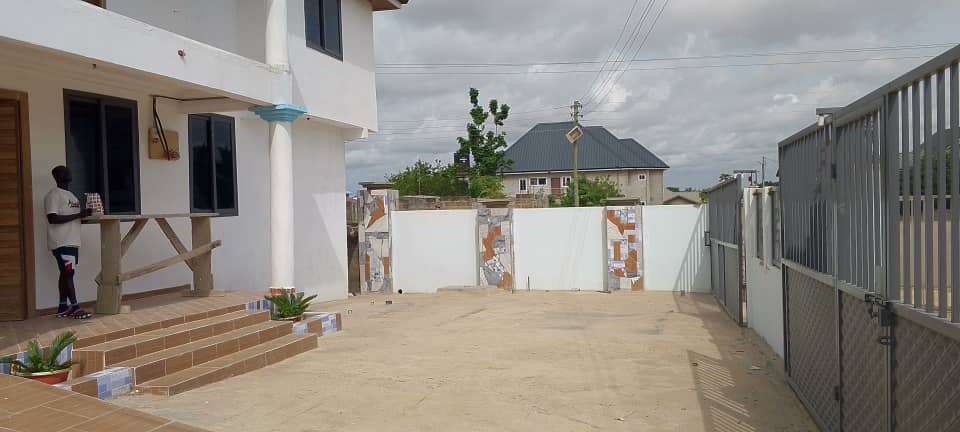 Five (5) Bedroom House with 3 Shops For Sale at Amasaman