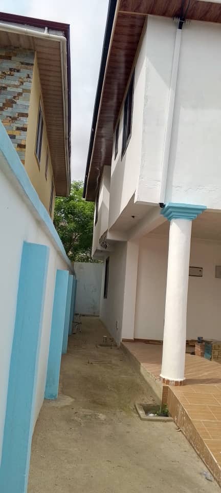 Five (5) Bedroom House with 3 Shops For Sale at Amasaman