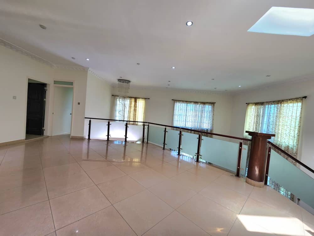 Four (4) Bedrooms Partially Furnished House With One Bedroom Outhouse for Rent at East Legon