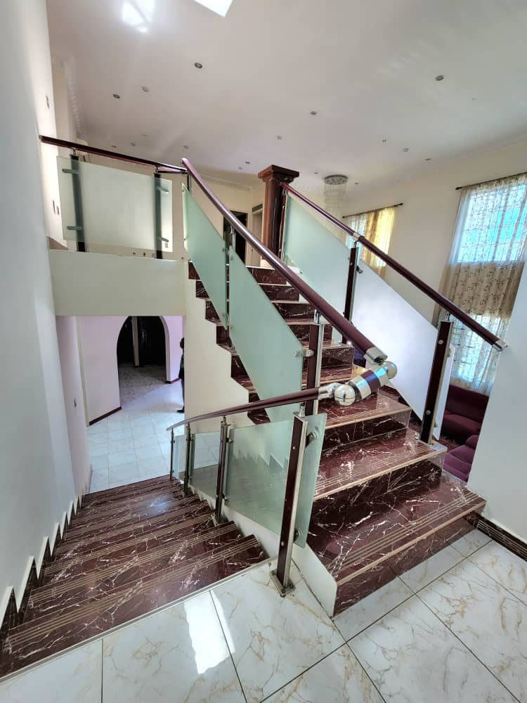 Four (4) Bedrooms Partially Furnished House With One Bedroom Outhouse for Rent at East Legon