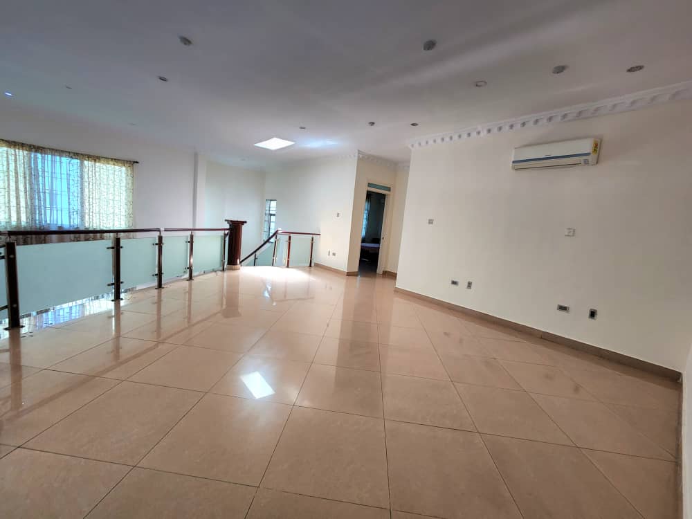 Four (4) Bedrooms Partially Furnished House With One Bedroom Outhouse for Rent at East Legon