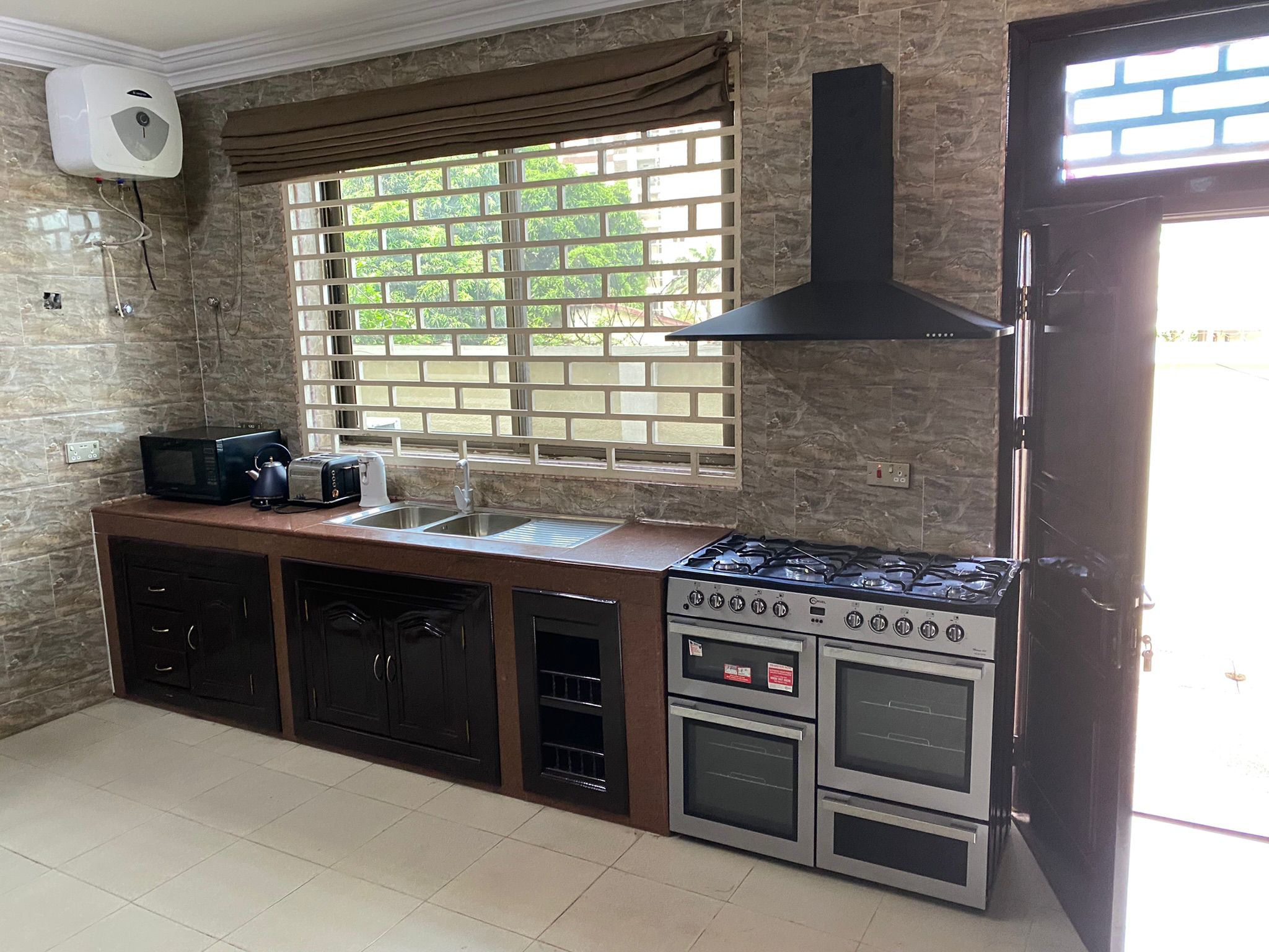 Four (4) Bedroom Fully Furnished House with 2 Boys' Quarters For Rent at Airport Residential Area