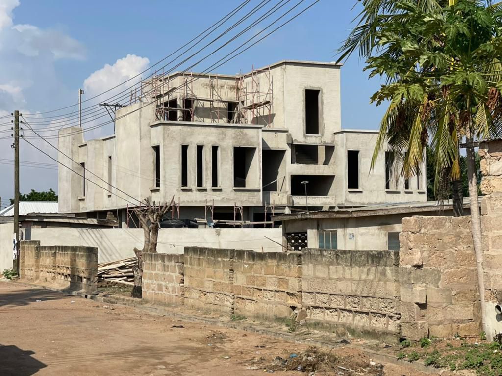 Uncompleted Five (5) Bedroom House with a Penthouse For Sale at Kasoa American Down