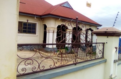 A 5 bedroom house with an uncompleted storey boys' quarters  for sale