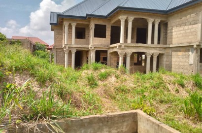 Nine bedroom uncompleted storey for sale at Abuakwa Agogo-Kumasi