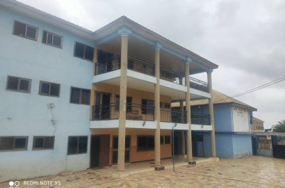 Thirty-seven bedroom house with 10 shops for sale in Kumasi
