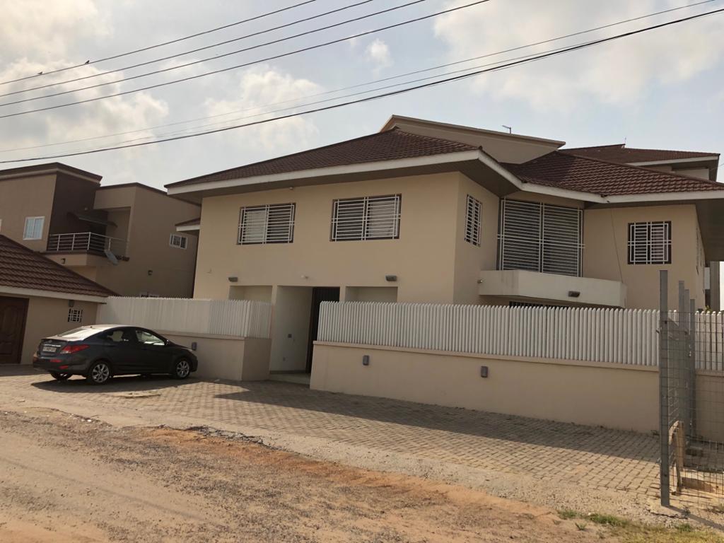 Land with 22-Room Property for Sale in East Legon