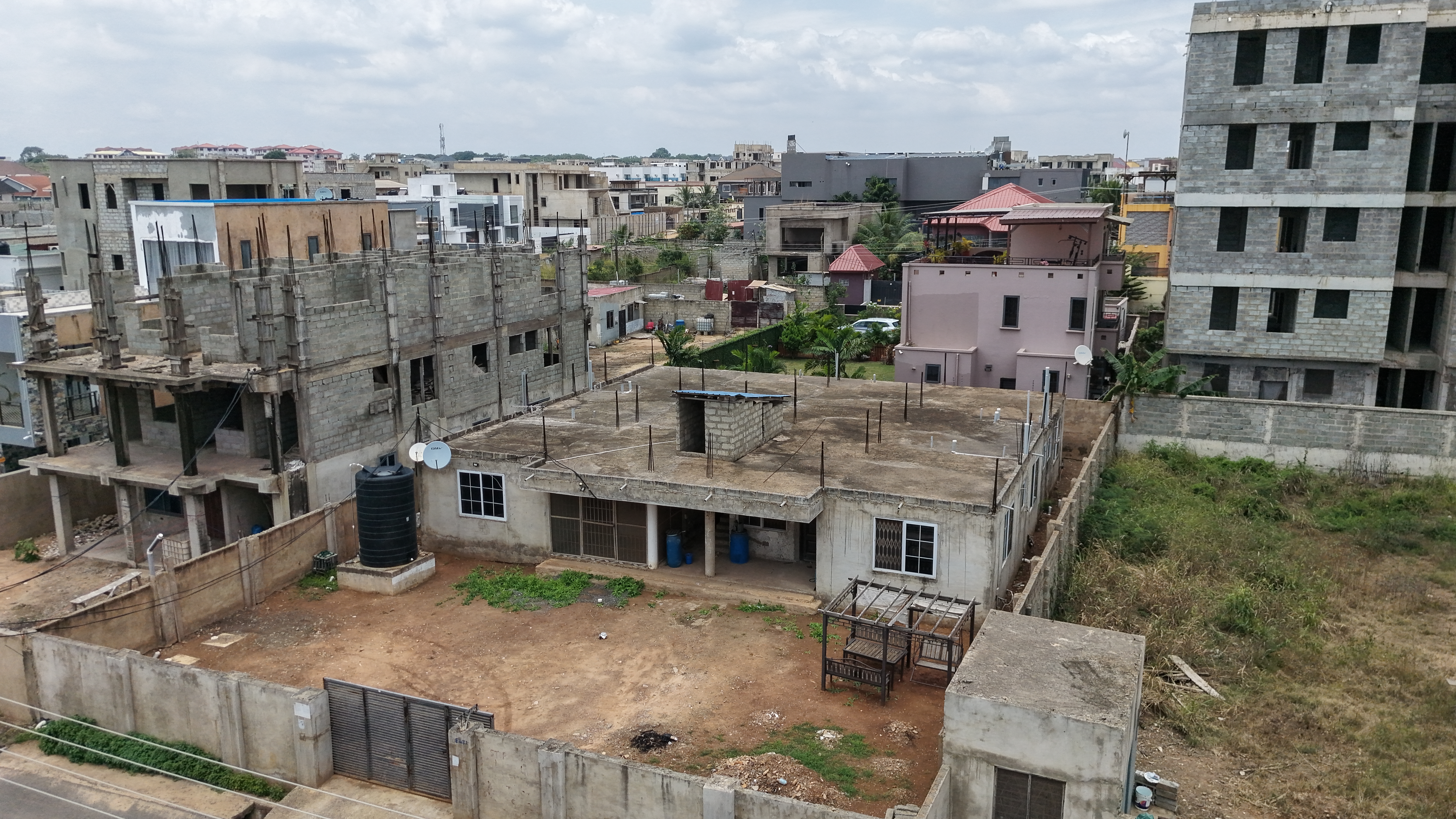 PRIME 1 PLOT OF LAND WITH EXISTING BUILDING FOR SALE AT TSE ADDO MAHAMA ROAD