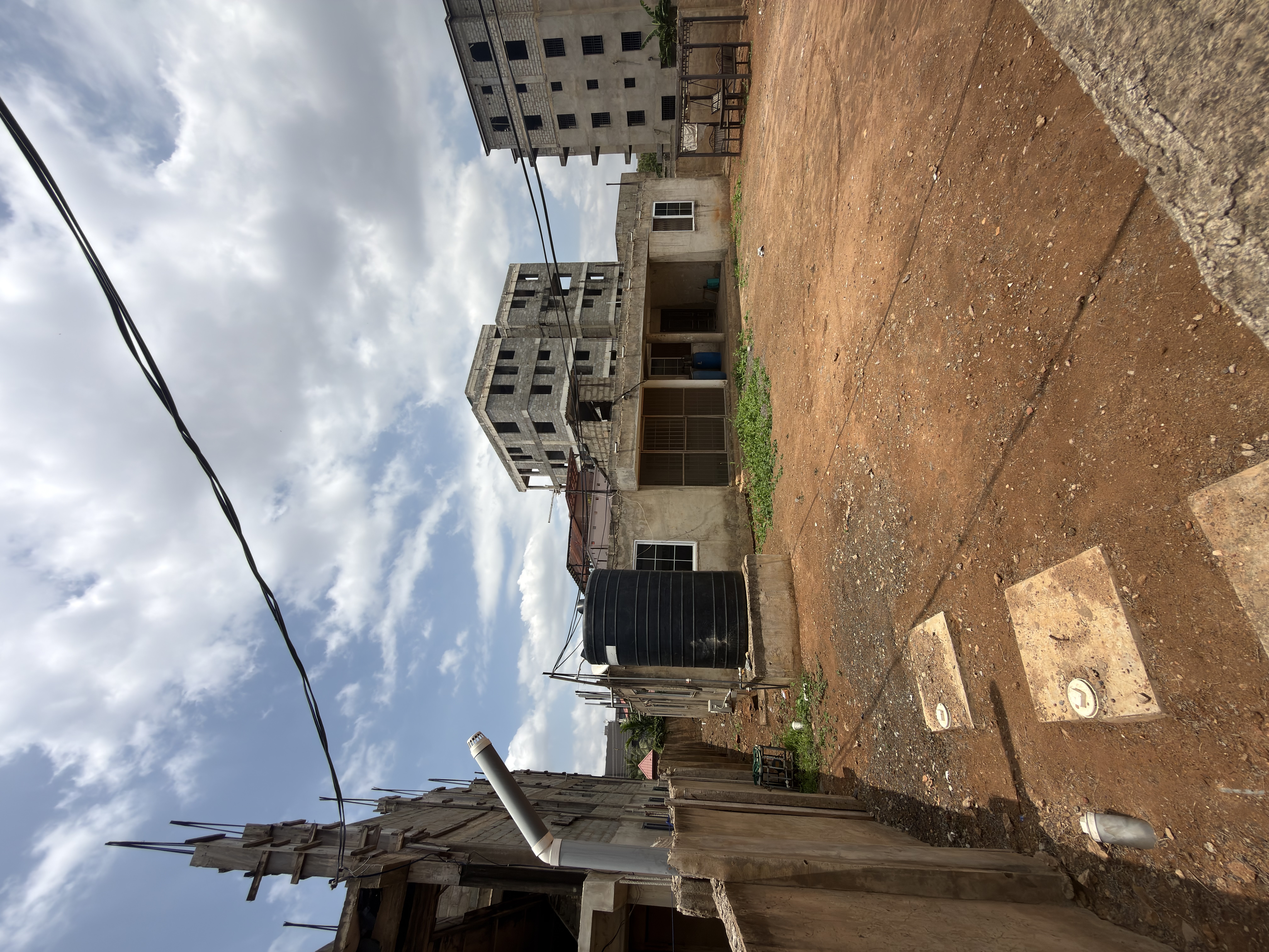 PRIME 1 PLOT OF LAND WITH EXISTING BUILDING FOR SALE AT TSE ADDO MAHAMA ROAD