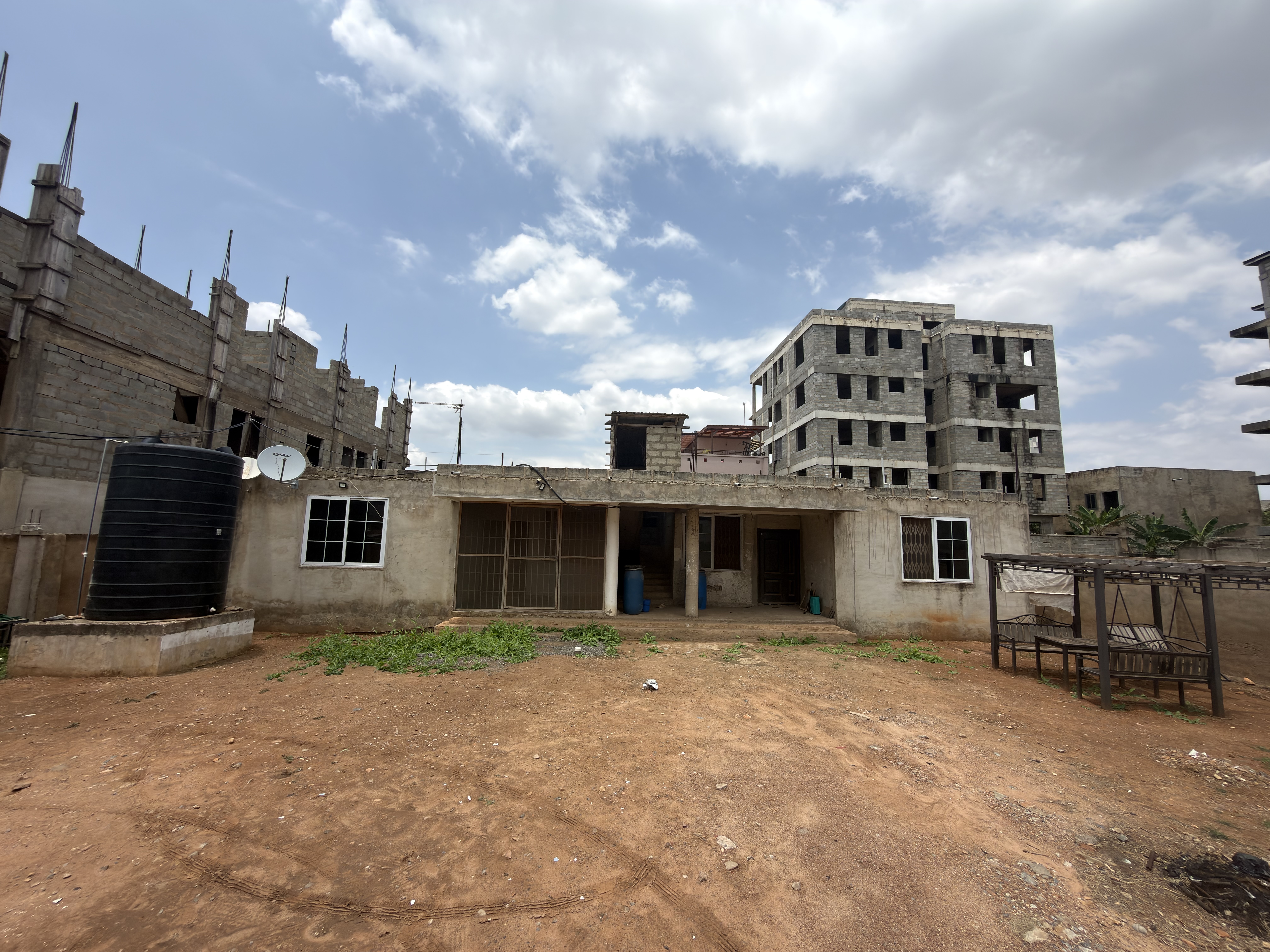 PRIME 1 PLOT OF LAND WITH EXISTING BUILDING FOR SALE AT TSE ADDO MAHAMA ROAD