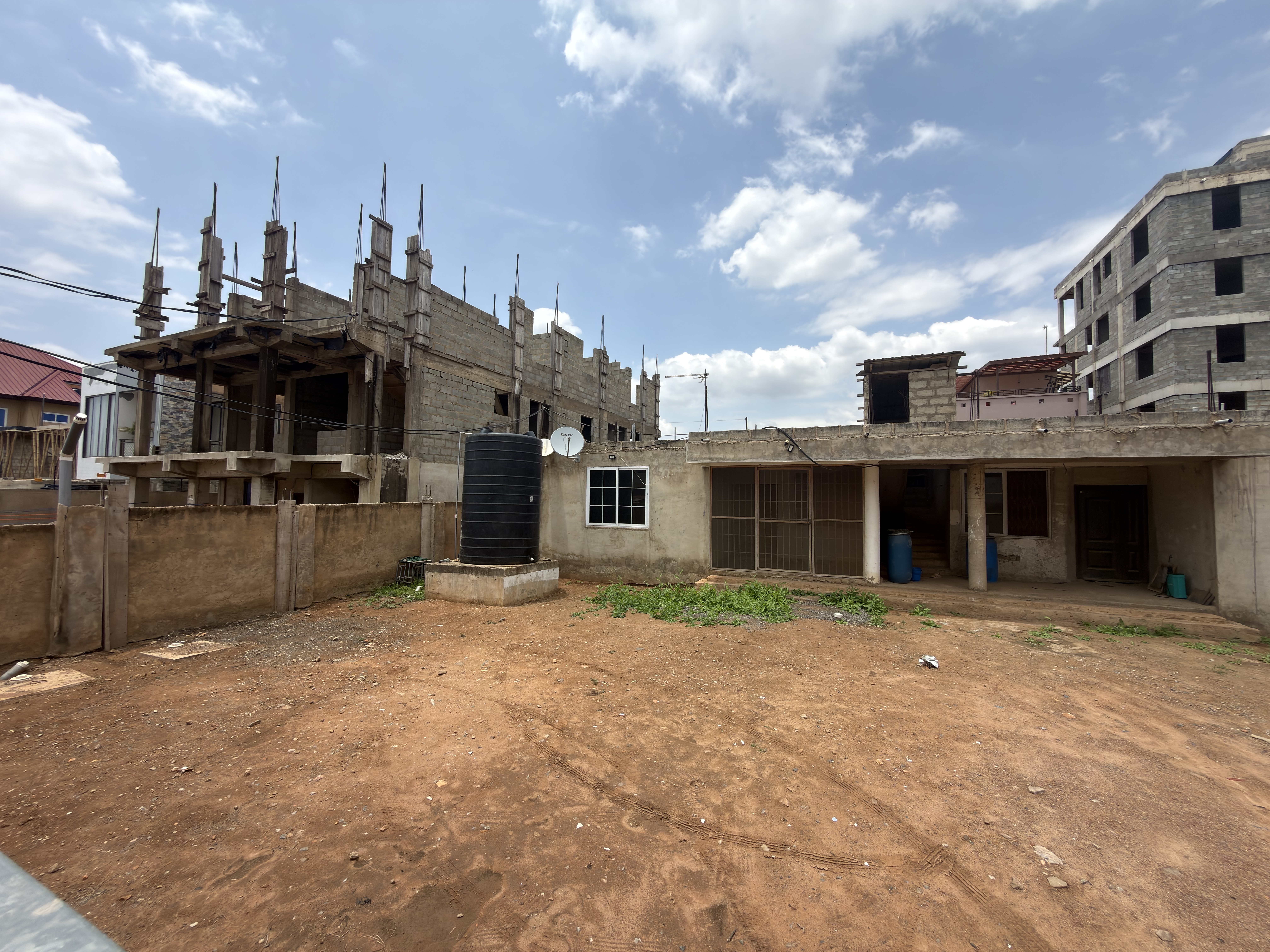 PRIME 1 PLOT OF LAND WITH EXISTING BUILDING FOR SALE AT TSE ADDO MAHAMA ROAD