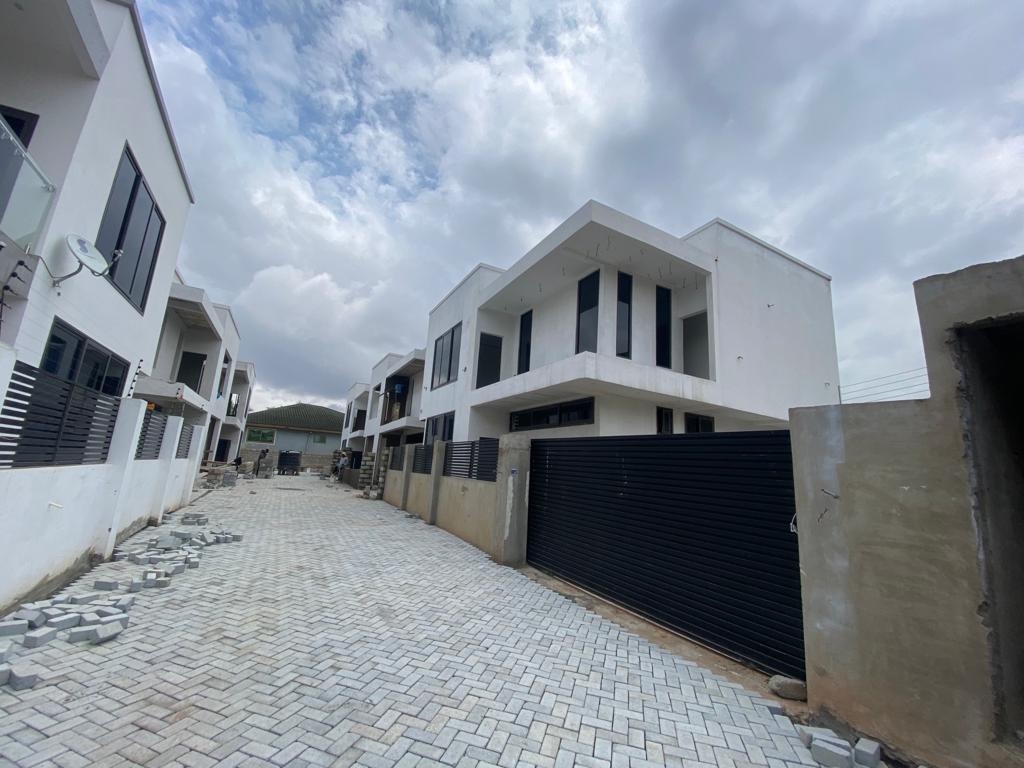 Newly Built Three 3-Bedroom Townhouse With 1 Boy's Quarter for Sale at Adjiringano
