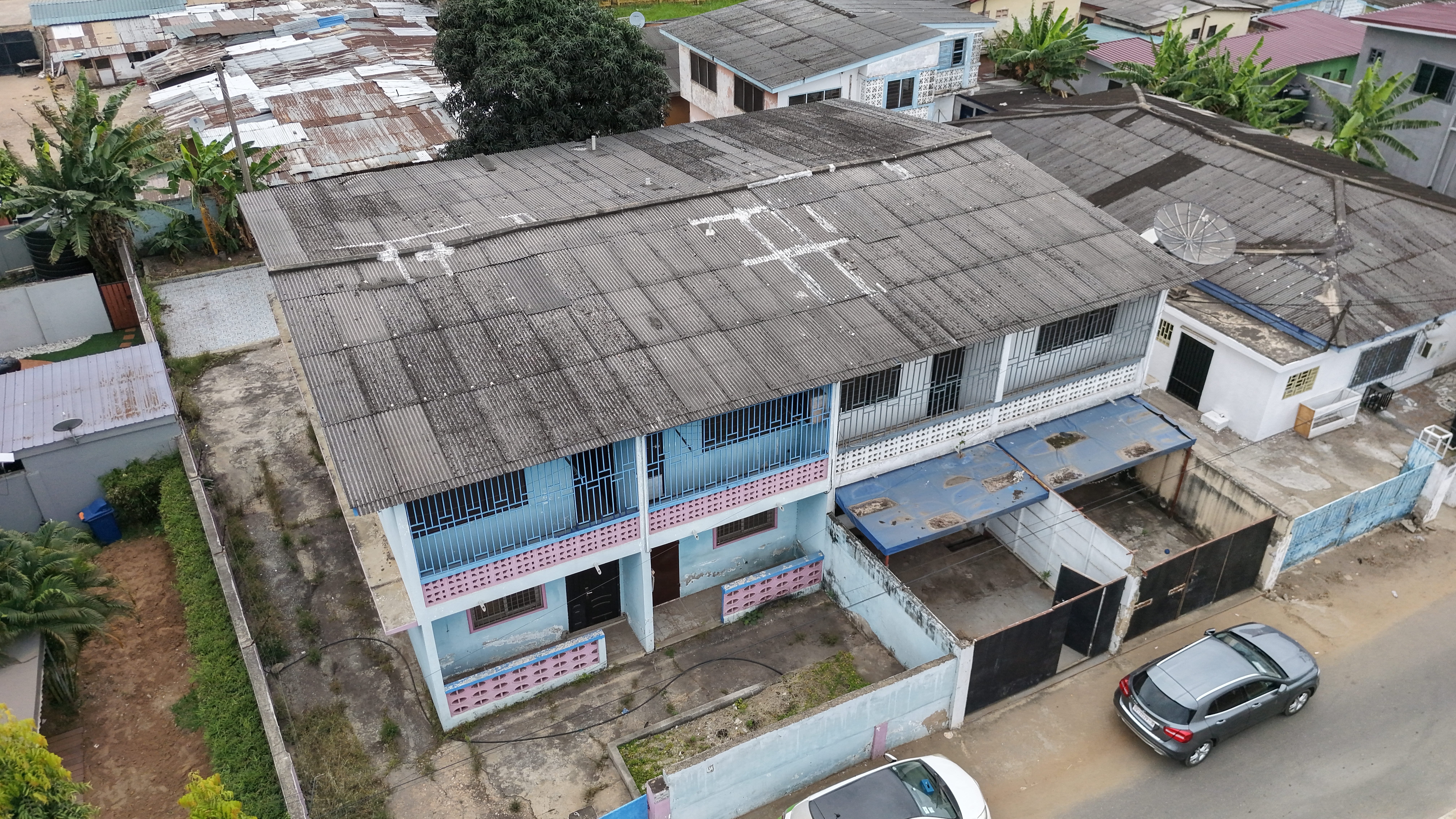 Prime Redevelopment Opportunity in Nima – Land with Existing Building for Sale