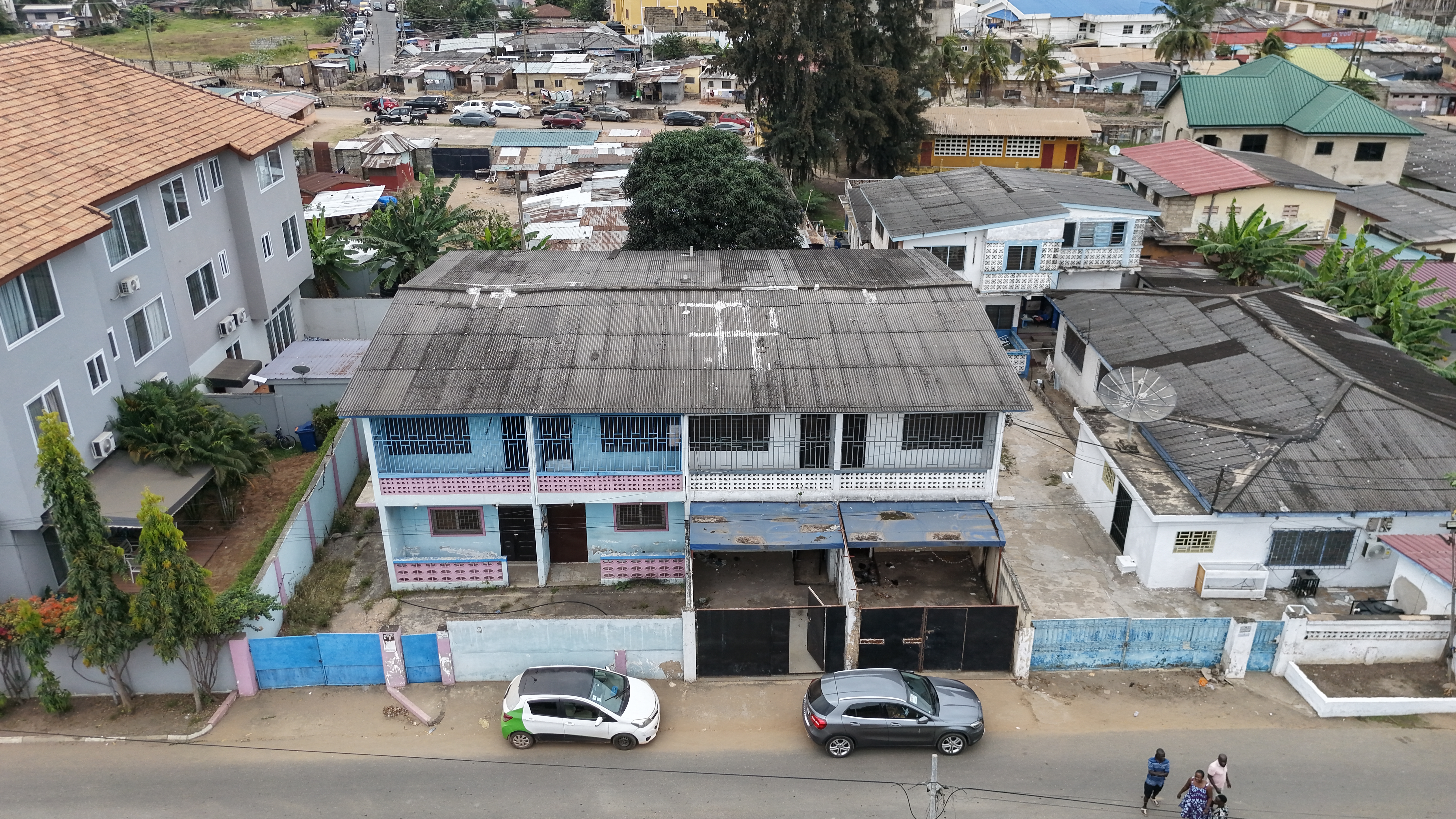 Prime Redevelopment Opportunity in Nima – Land with Existing Building for Sale