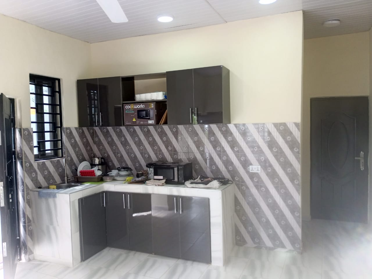 Three (3) Bedroom House with 1-Bedroom Outhouse For Sale at Ashongman Estate