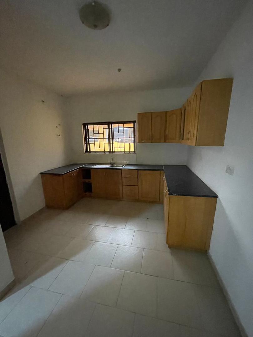 Three (3) Bedroom Semi-detached House with an Outhouse For Sale at Tema Community 25