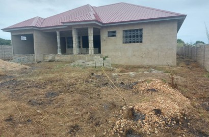 Uncompleted 4 bedrooms house with garage and study room for sale at Prampram