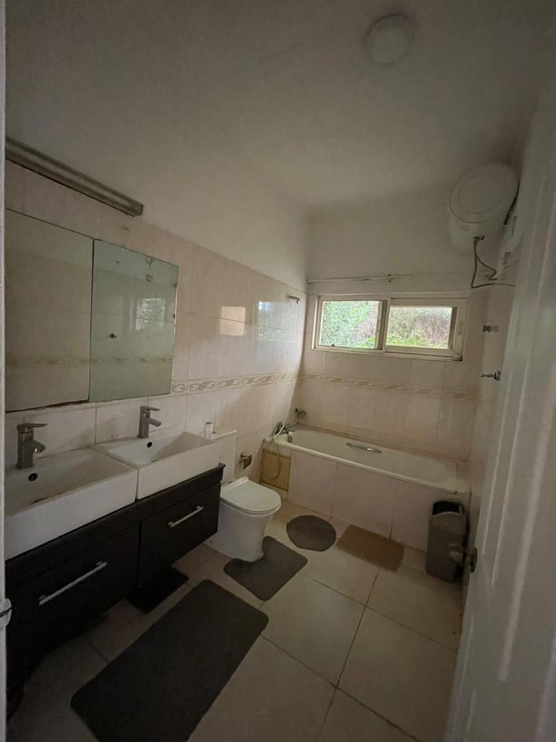 3 Bedroom with 2 boys quarters for sale at Regimanuel Gray East Airport